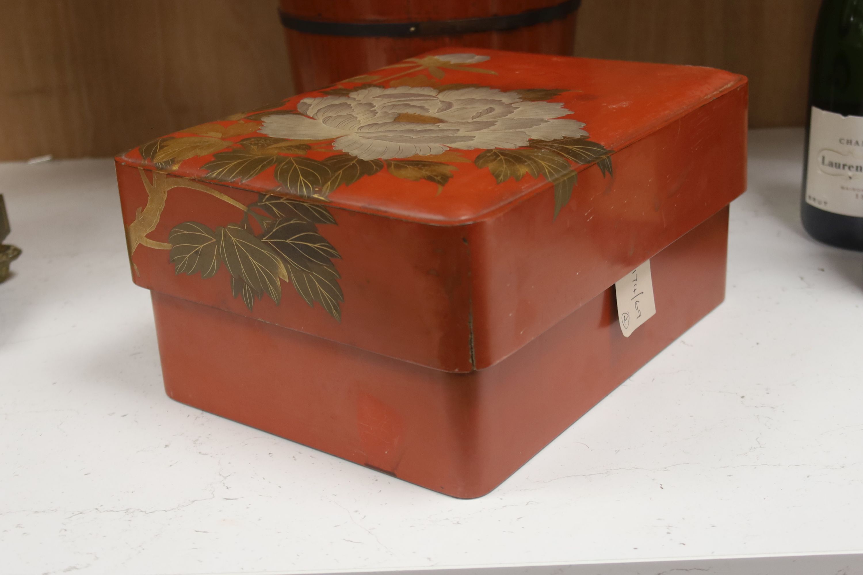 A Chinese red-lacquered rice container and cover and a similar Japanese rectangular box and cover (2)